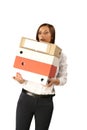 Secretary woman with a large stack of folders isolated on white background Royalty Free Stock Photo