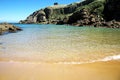 A secretive sandy cove on the north coast of Spain. Royalty Free Stock Photo