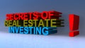 Secrets of real estate investing on blue Royalty Free Stock Photo