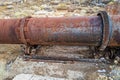 A section of a big rusty pipe at an abandoned mercury mine in Nevada, USA Royalty Free Stock Photo