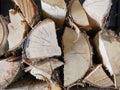 Section of cutting wood stacked store for fireplace in the winter Royalty Free Stock Photo