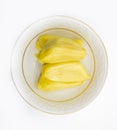 section of jackfruit in a plate isolated on white background, selective focus Royalty Free Stock Photo