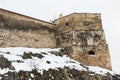 A Section of a Medieval Fortification Wall Covered by Snow in Late Winter Royalty Free Stock Photo