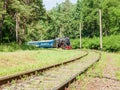 Old steam locomotive with passenger train in motion Royalty Free Stock Photo