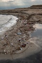 Garbage lines the shoreline of Israel\'s Dead Sea Royalty Free Stock Photo