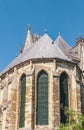 Section of smaller towers, three tall panals of stained glass, back side of, cathedral of, our lady of Rhems, against a blue sky Royalty Free Stock Photo