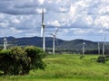 A section of a wind farm showing seven wind turbines in the Atherton Tablelands Royalty Free Stock Photo