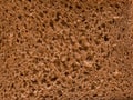 Sectional texture of rye flour bread. Crumb. Background, surface. Food. Royalty Free Stock Photo