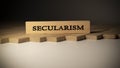 Secularism was written on a wooden surface. finance and politics Royalty Free Stock Photo