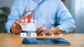 Secure data upload and cloud file sharing concept with businessman touching virtual folder icon Royalty Free Stock Photo