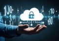 A secure digital future: hand holding locked cloud with binary codes Royalty Free Stock Photo