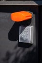 Secure entrance keypad for gate door made from steel covered with light security Royalty Free Stock Photo