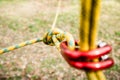 Secure fastening of the rope to the climbing carabiner, node in focus