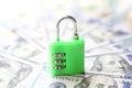Secure money padlock concept. US dollars