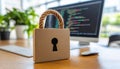 Secure Software Development Code on Computer Screen, Padlock Symbol, and Blurred Background