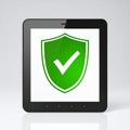Secure Tablet with Green Shield Checkmark Icon Royalty Free Stock Photo