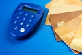 Secure wireless payment concept. Gold credit cards and security remote Royalty Free Stock Photo