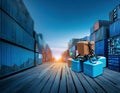 Secured Cargo Boxes in Shipping Container Yard. Dusk industrial port Royalty Free Stock Photo