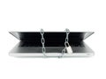 Secured laptop with chain and lock Royalty Free Stock Photo