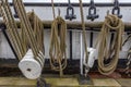 Secured rope rigging lines tied on deck of sailing ship Royalty Free Stock Photo