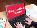 Securities fraud is shown on the photo using the text Royalty Free Stock Photo
