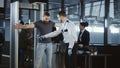 Security agent patting down a male passenger Royalty Free Stock Photo
