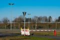 Security barrier at an empty parking area during clear weather Royalty Free Stock Photo