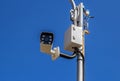 The security camera against blue sky Royalty Free Stock Photo