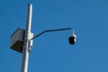 Security Camera Against a Blue Sky