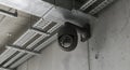 Security Camera on Ceiling with Metal Ductwork Royalty Free Stock Photo