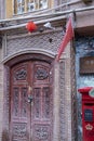 Security camera and Chinese flag over locked door, Kashgar, Xinjiang, CHina Royalty Free Stock Photo