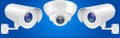 Security camera set. Wall and ceiling mount CCTV surveillance system on blue background Royalty Free Stock Photo