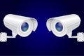 Security camera set. White CCTV surveillance system on blue background Royalty Free Stock Photo