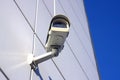 Security camera under sky Royalty Free Stock Photo