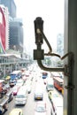 A security camera watching over jammed traffic. Blurred and bright background