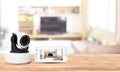 Security camera on Wood table. IP Camera Royalty Free Stock Photo