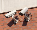 Security cameras on a building wall Royalty Free Stock Photo