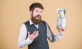 Security and cash money savings. Banking concept. General savings tips. Man bearded hipster hold jar full of cash Royalty Free Stock Photo