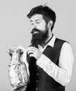 Security and cash money savings. Banking concept. Man bearded guy hold jar full of cash savings. Establish your budget