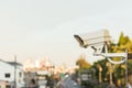 Security CCTV camera operating over the road Royalty Free Stock Photo