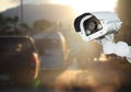 Security CCTV camera operating over the road.Morning CCTV with Royalty Free Stock Photo