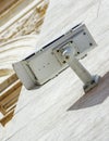 security CCTV camera or surveillance system fixed on old construction wall Royalty Free Stock Photo