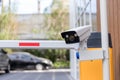 Security CCTV camera surveillance system outdoor of carpark. A blurred night city scape background. Modern CCTV camera on a wall. Royalty Free Stock Photo