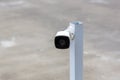 Security CCTV camera surveillance system outdoor of house. A blurred night city scape background. Modern CCTV camera on a wall. Eq Royalty Free Stock Photo