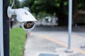 Security CCTV camera surveillance system outdoor of house. A blurred night city scape background. Modern CCTV camera on a wall. Royalty Free Stock Photo