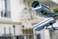 security CCTV camera or surveillance system with private builiding on blurry background Royalty Free Stock Photo