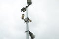 Security CCTV cameras and loudspeaker mounted on the post for street surveillance.