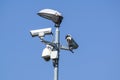 Security cctv cameras on a pole with blue sky background Royalty Free Stock Photo
