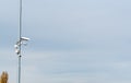 Security cctv cameras on a pole with blue sky background cloudy Royalty Free Stock Photo