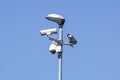Security cctv cameras on a pole with blue sky background Royalty Free Stock Photo
